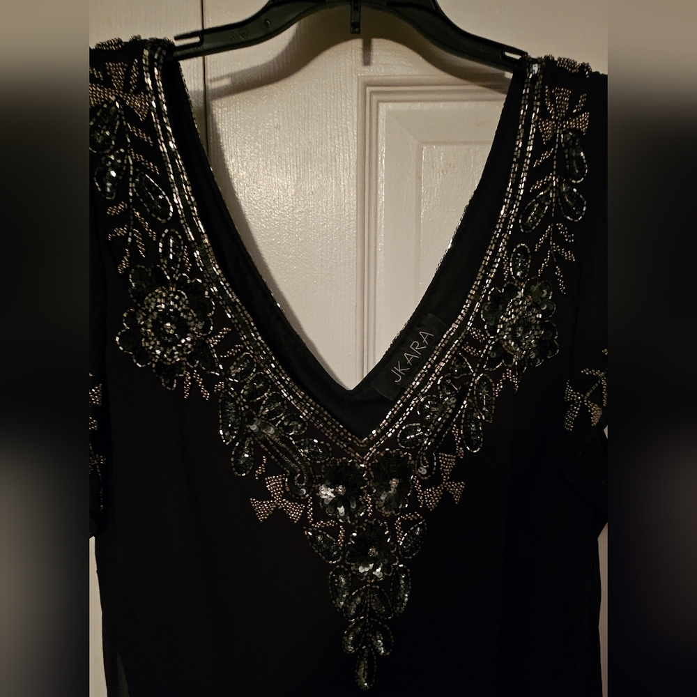 Absolutely gorgeous Cocktail Dress in Black with beautiful Beading.